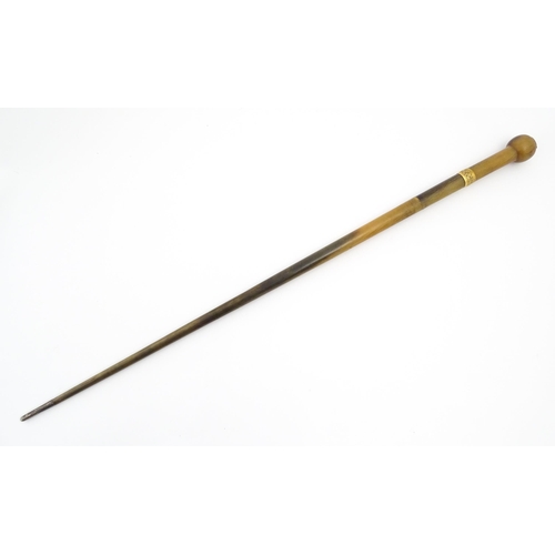 1273 - A late 19thC rhino horn walking stick / cane with yellow metal collar and mount to top. Approx. 35