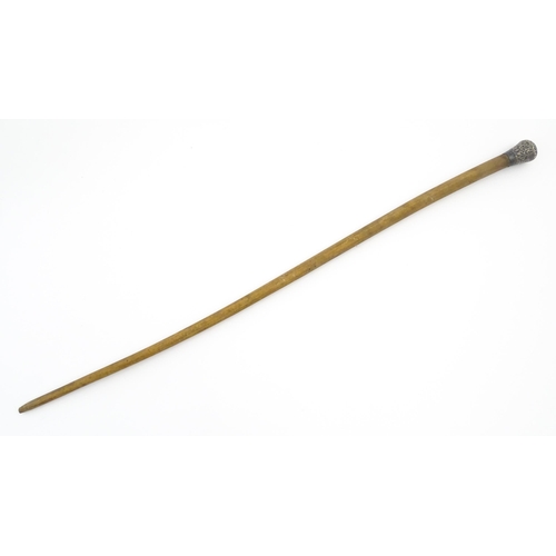 1279 - An early 20thC bull pizzle walking stick / cane with white metal pommel, possibly Indian. Approx. 34... 