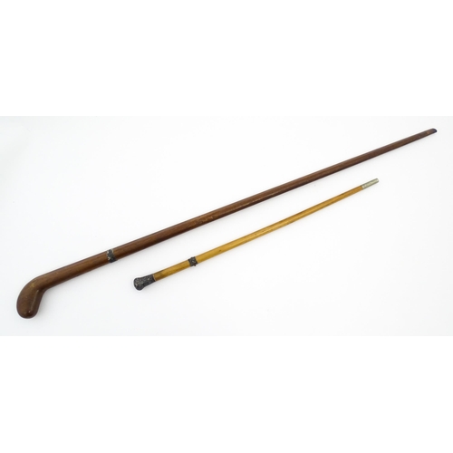 1282 - An early 20thC Sunday stick formed as a stylised golf club. Together with a swagger stick with white... 