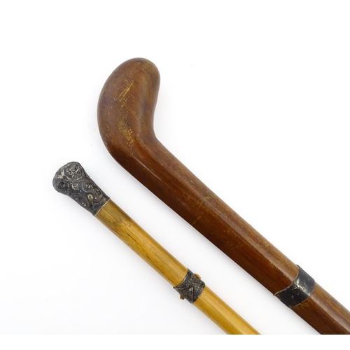 1282 - An early 20thC Sunday stick formed as a stylised golf club. Together with a swagger stick with white... 