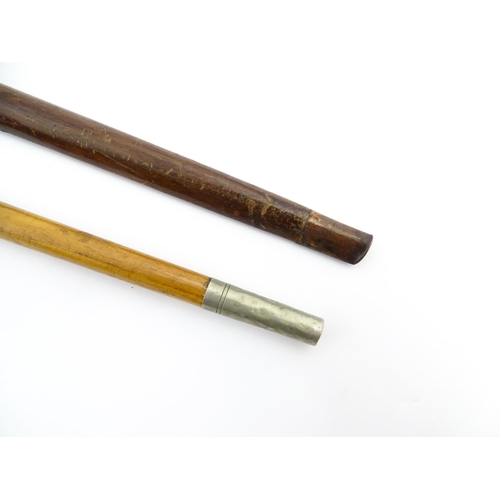 1282 - An early 20thC Sunday stick formed as a stylised golf club. Together with a swagger stick with white... 