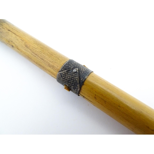 1282 - An early 20thC Sunday stick formed as a stylised golf club. Together with a swagger stick with white... 