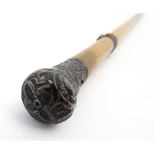 1282 - An early 20thC Sunday stick formed as a stylised golf club. Together with a swagger stick with white... 