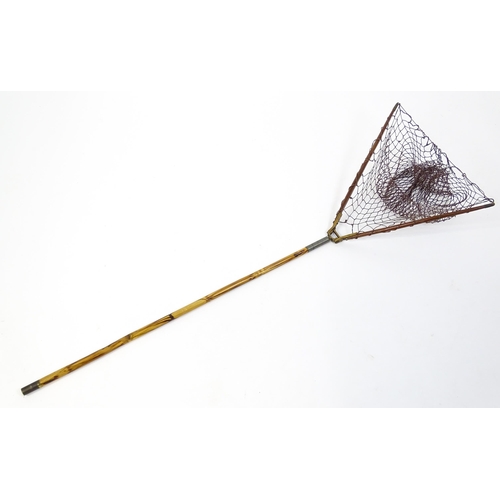 1286 - An early 20thC folding fishing / angling landing net, the bamboo shaft supporting a mahogany frame w... 