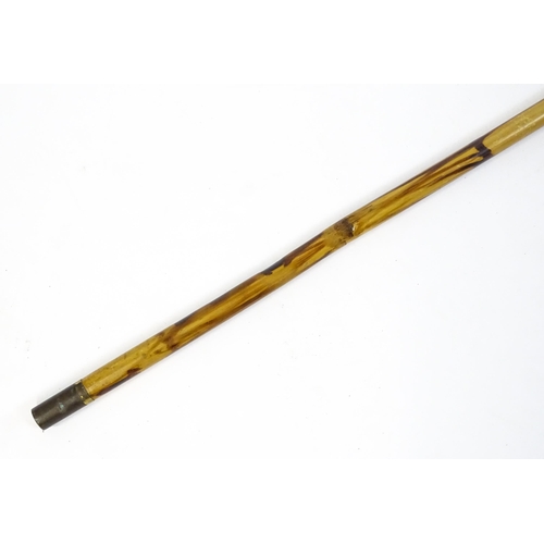 1286 - An early 20thC folding fishing / angling landing net, the bamboo shaft supporting a mahogany frame w... 