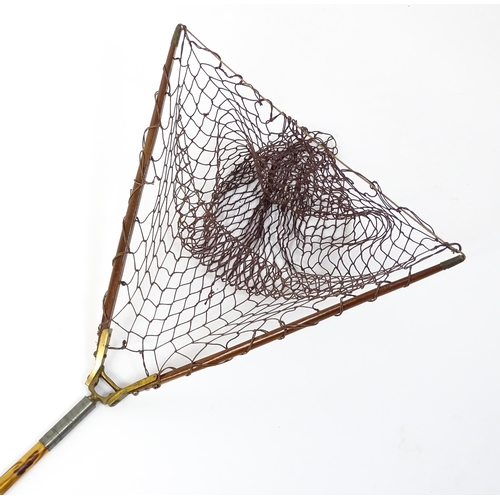 1286 - An early 20thC folding fishing / angling landing net, the bamboo shaft supporting a mahogany frame w... 