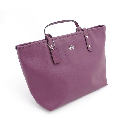 1319 - Vintage fashion / clothing: A Coach Crossgrain Leather City Zip Tote F57522 in Mauve including a mat... 