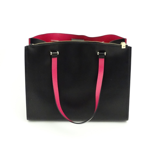 1320 - Vintage fashion / clothing: A Kate Spade tote bag in black, approx. 14 1/2