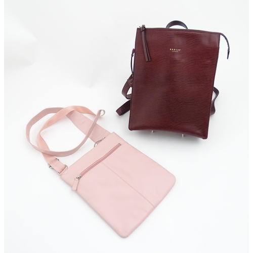 1324 - Vintage fashion / clothing: Two Radley handbags comprising a pale pink crossbody bag, approx 8 1/2