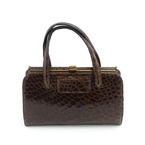 1328 - Vintage fashion / clothing: Six brown leather handbags. Together with a brown leather wallet. The la... 