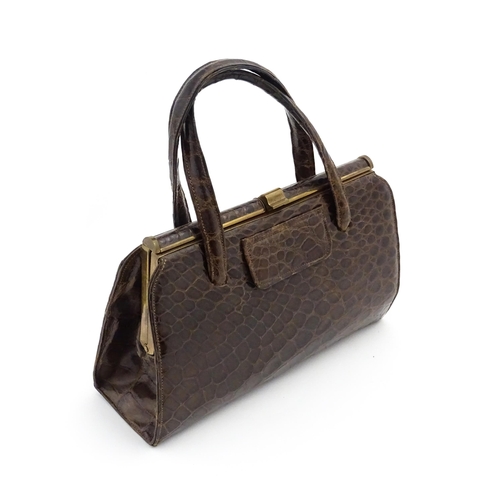 1328 - Vintage fashion / clothing: Six brown leather handbags. Together with a brown leather wallet. The la... 