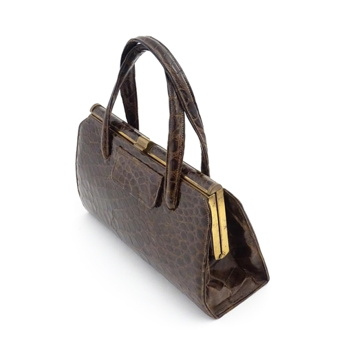 1328 - Vintage fashion / clothing: Six brown leather handbags. Together with a brown leather wallet. The la... 