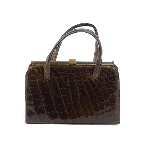 1328 - Vintage fashion / clothing: Six brown leather handbags. Together with a brown leather wallet. The la... 