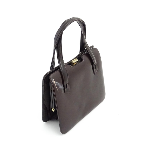 1328 - Vintage fashion / clothing: Six brown leather handbags. Together with a brown leather wallet. The la... 