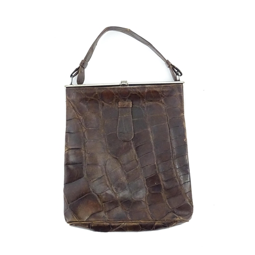 1328 - Vintage fashion / clothing: Six brown leather handbags. Together with a brown leather wallet. The la... 