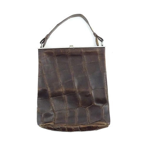 1328 - Vintage fashion / clothing: Six brown leather handbags. Together with a brown leather wallet. The la... 