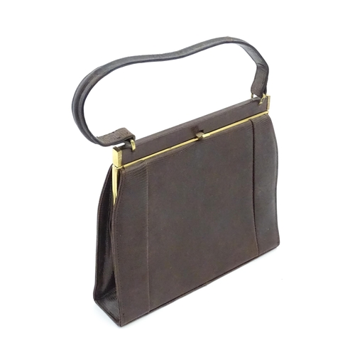 1328 - Vintage fashion / clothing: Six brown leather handbags. Together with a brown leather wallet. The la... 