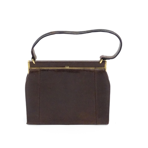 1328 - Vintage fashion / clothing: Six brown leather handbags. Together with a brown leather wallet. The la... 