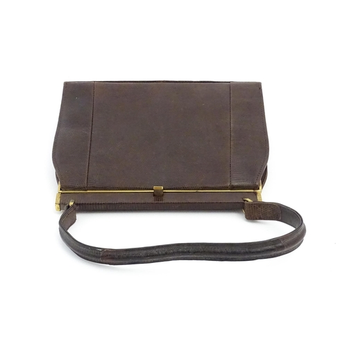 1328 - Vintage fashion / clothing: Six brown leather handbags. Together with a brown leather wallet. The la... 