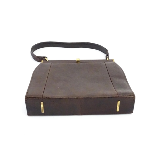 1328 - Vintage fashion / clothing: Six brown leather handbags. Together with a brown leather wallet. The la... 