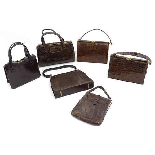 1328 - Vintage fashion / clothing: Six brown leather handbags. Together with a brown leather wallet. The la... 