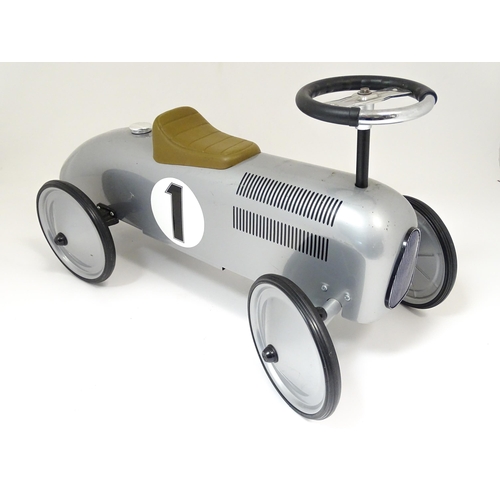 871 - Toy: A German Gollnest & Kiesel childs ride on / push along racing car. Approx. 29