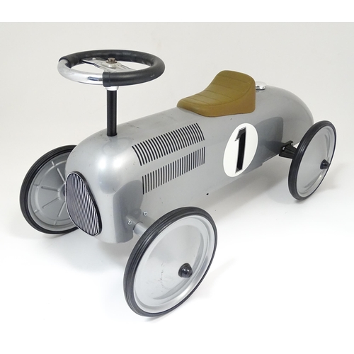 871 - Toy: A German Gollnest & Kiesel childs ride on / push along racing car. Approx. 29