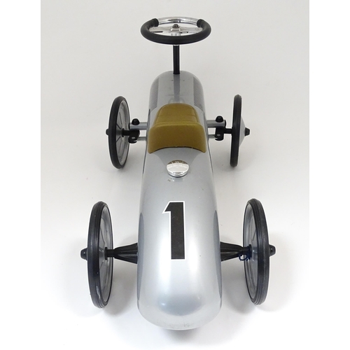 871 - Toy: A German Gollnest & Kiesel childs ride on / push along racing car. Approx. 29