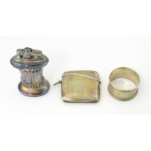 409 - Three assorted items to include a large silver vesta case with engine turned decoration hallmarked B... 