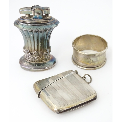 409 - Three assorted items to include a large silver vesta case with engine turned decoration hallmarked B... 