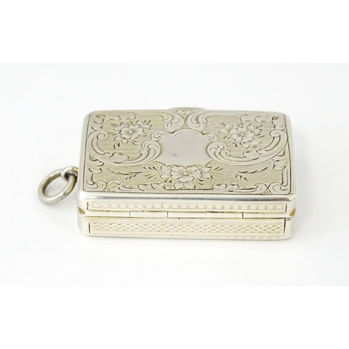 412 - A Victorian silver vinaigrette with gilt interior, hallmarked Birmingham 1857, maker Aston & Son. Ap... 