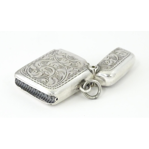 420 - A silver vesta case with engraved acanthus scroll decoration, hallmarked Birmingham 1908, maker Samu... 