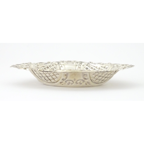 422 - A silver bon bon dish with embossed decoration, hallmarked London 1957, maker Taite & Sons. Approx. ... 