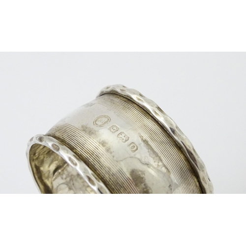 429 - Two silver napkin rings, one with engine turned decoration hallmarked Birmingham 1938, maker Francis... 