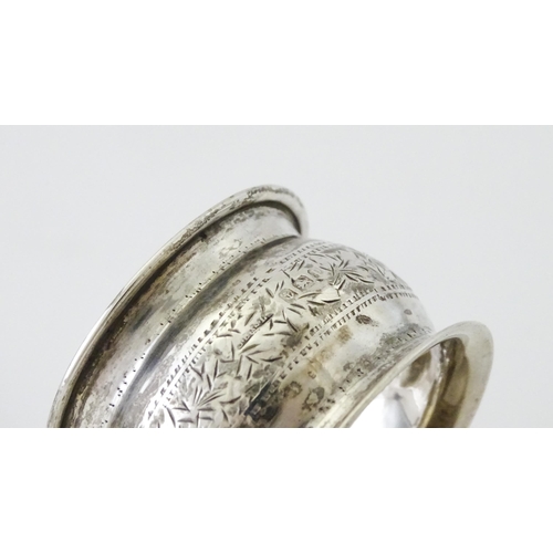 429 - Two silver napkin rings, one with engine turned decoration hallmarked Birmingham 1938, maker Francis... 