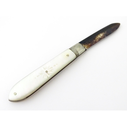 436 - A silver folding fruit knife with mother of pearl handle hallmarked Sheffield 1909, maker Henry Will... 