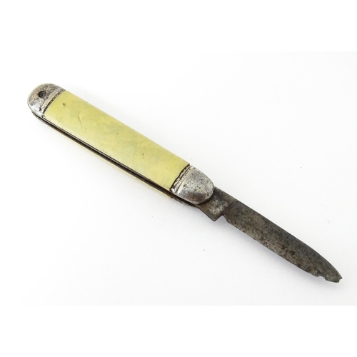 436 - A silver folding fruit knife with mother of pearl handle hallmarked Sheffield 1909, maker Henry Will... 