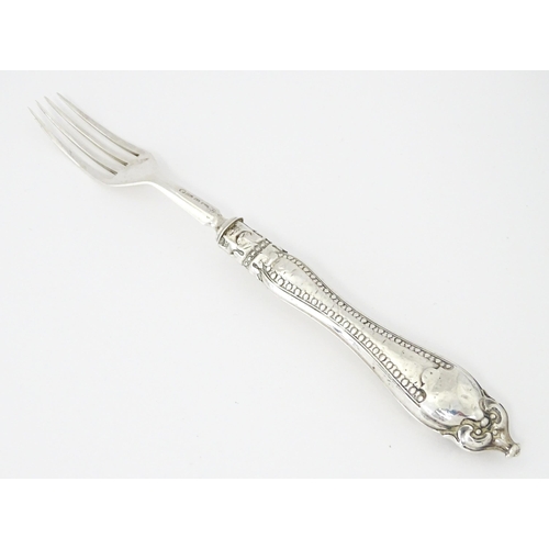 437 - A Victorian silver fork hallmarked Sheffield c. 1869, maker Martin, Hall & Co. Approx. 6 1/4