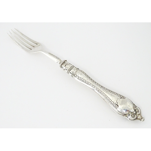 437 - A Victorian silver fork hallmarked Sheffield c. 1869, maker Martin, Hall & Co. Approx. 6 1/4