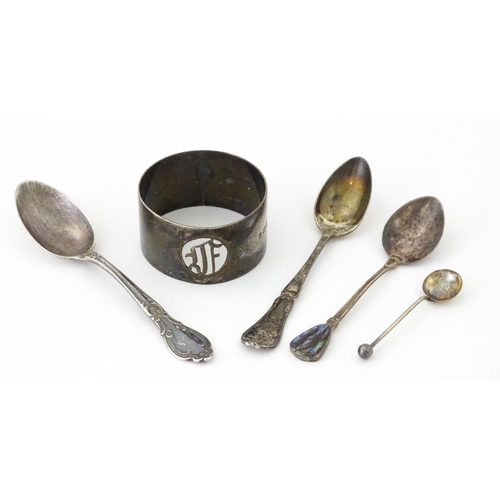 438 - Four assorted silver spoons. 

A silver napkin ring hallmarked Birmingham 1923, maker S. Blanckensee... 