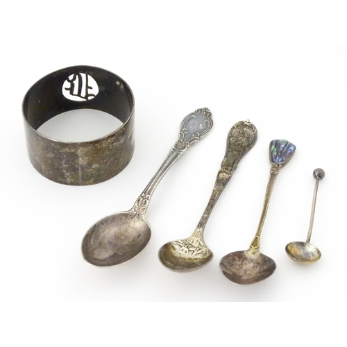 438 - Four assorted silver spoons. 

A silver napkin ring hallmarked Birmingham 1923, maker S. Blanckensee... 