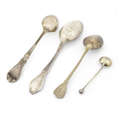 438 - Four assorted silver spoons. 

A silver napkin ring hallmarked Birmingham 1923, maker S. Blanckensee... 