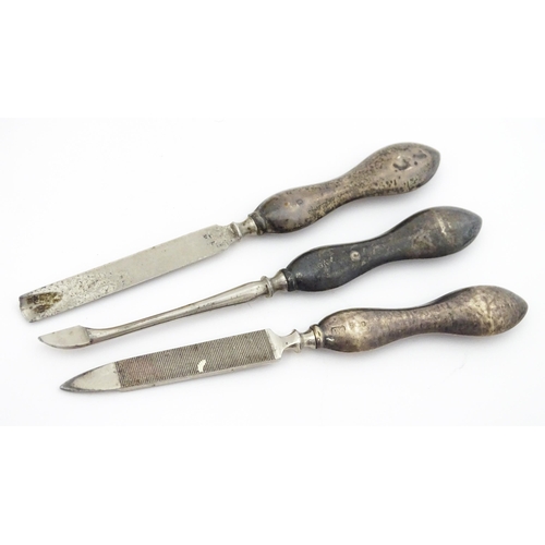 440 - A quantity of silver manicure tools etc within a leather case having engine turned decoration and ha... 