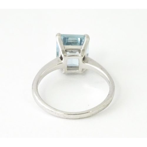 630 - An 18ct white gold ring set with aquamarine. Ring size approx. M