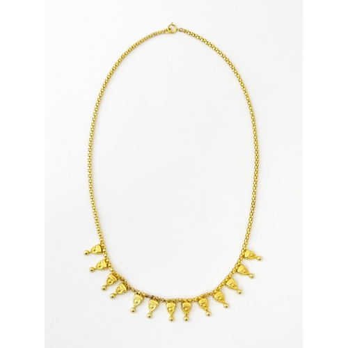 638 - An 18ct gold, 14ct gold and yellow metal necklace. Approx. 18