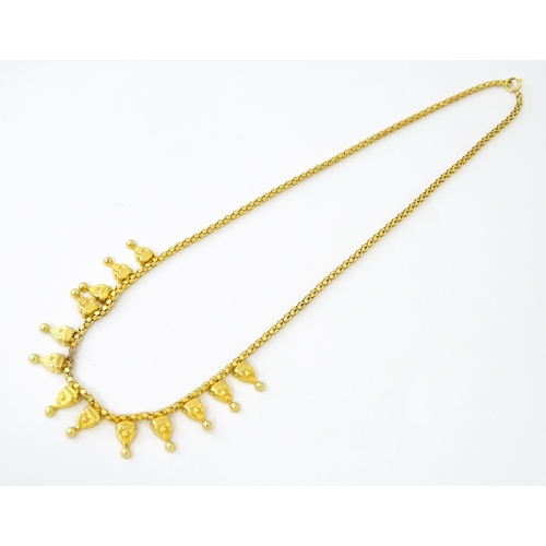 638 - An 18ct gold, 14ct gold and yellow metal necklace. Approx. 18