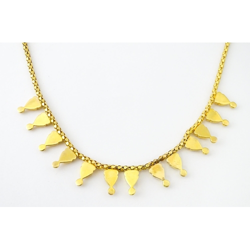 638 - An 18ct gold, 14ct gold and yellow metal necklace. Approx. 18