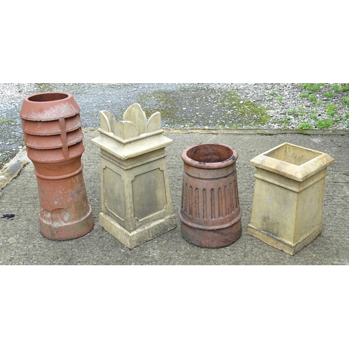 1334 - Four chimney pots, to include two terracotta and two stoneware examples, the largest approx 31