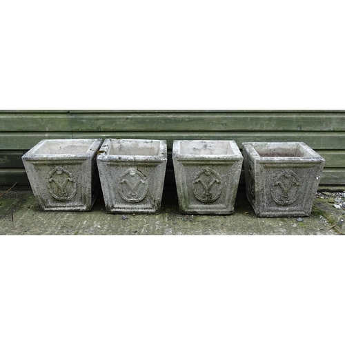 1337 - Four matching reconstituted stone planters, of tapering form and decorated with Prince of Wales' fea... 