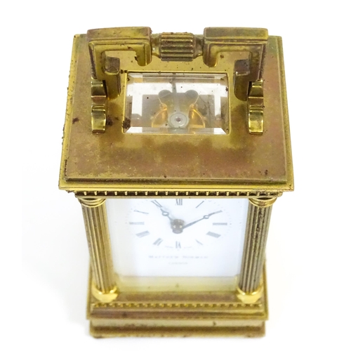 1401 - A Matthew Norman small brass carriage clock.  Approx 4 1/2